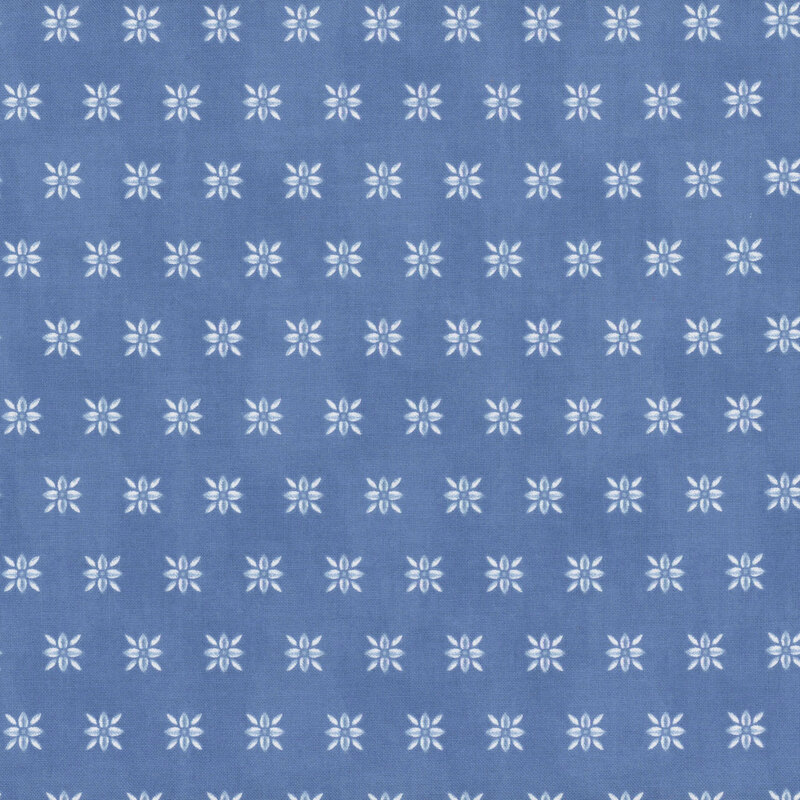 Light blue fabric with a repeating, white, ornamental floral design spaced evenly apart.