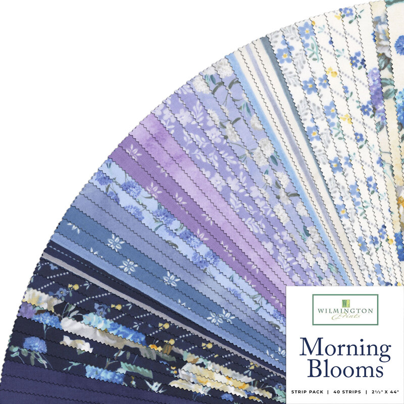 A fanned collage of navy, purple, and cream fabrics in the Morning Blooms collection.