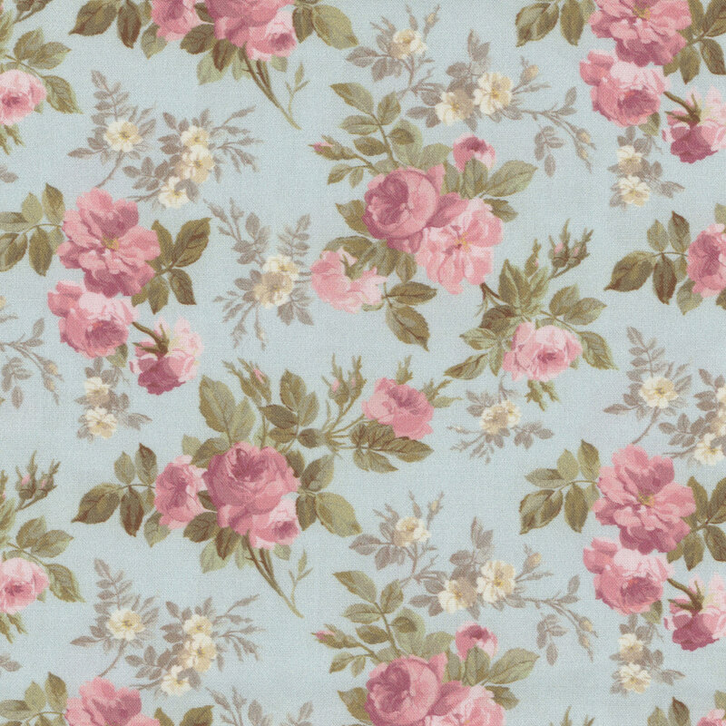 Floral fabric featuring pink roses and green leaves on a light blue background.