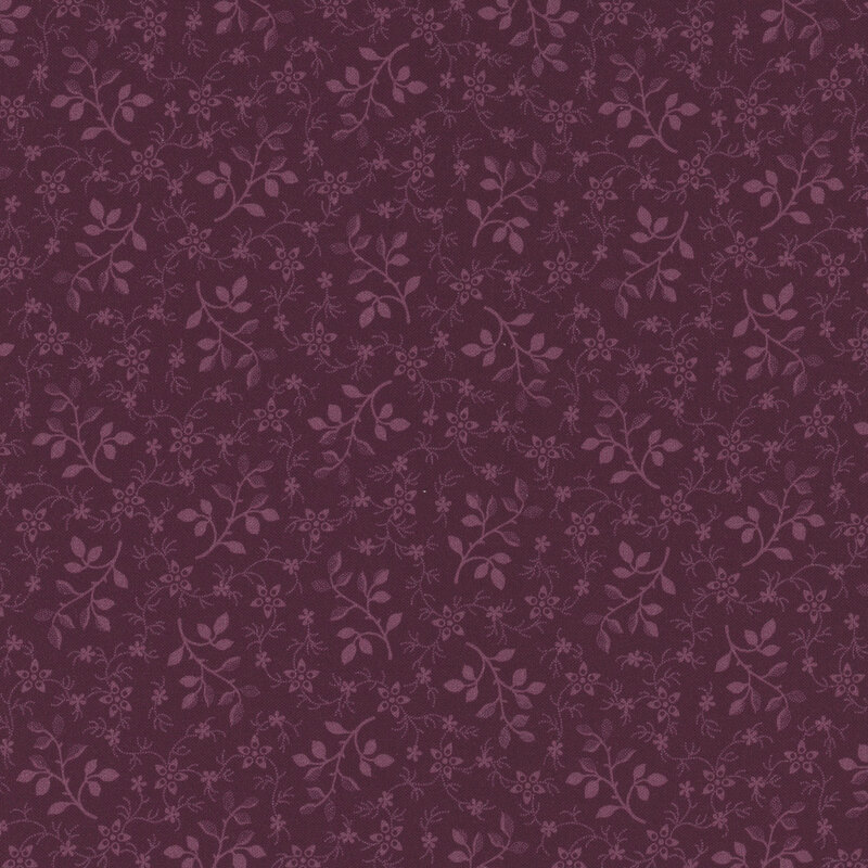 tonal purple fabric with long connected stems and leaves coming off of small five-pointed flowers