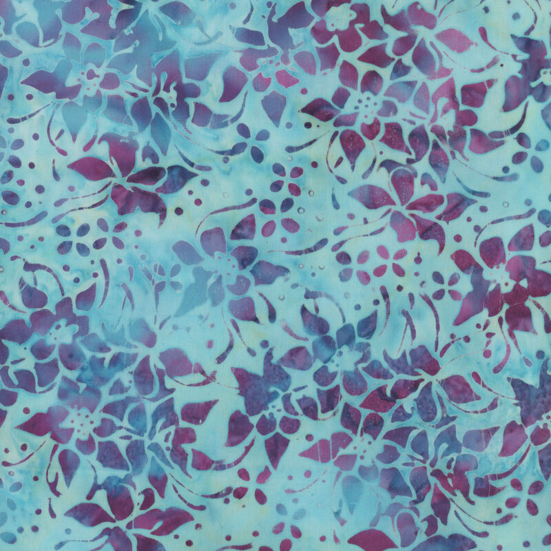 Aqua blue mottled batik fabric with deep purple flowers throughout