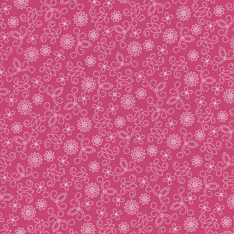 Magenta pink fabric with white swirls and flower overlay