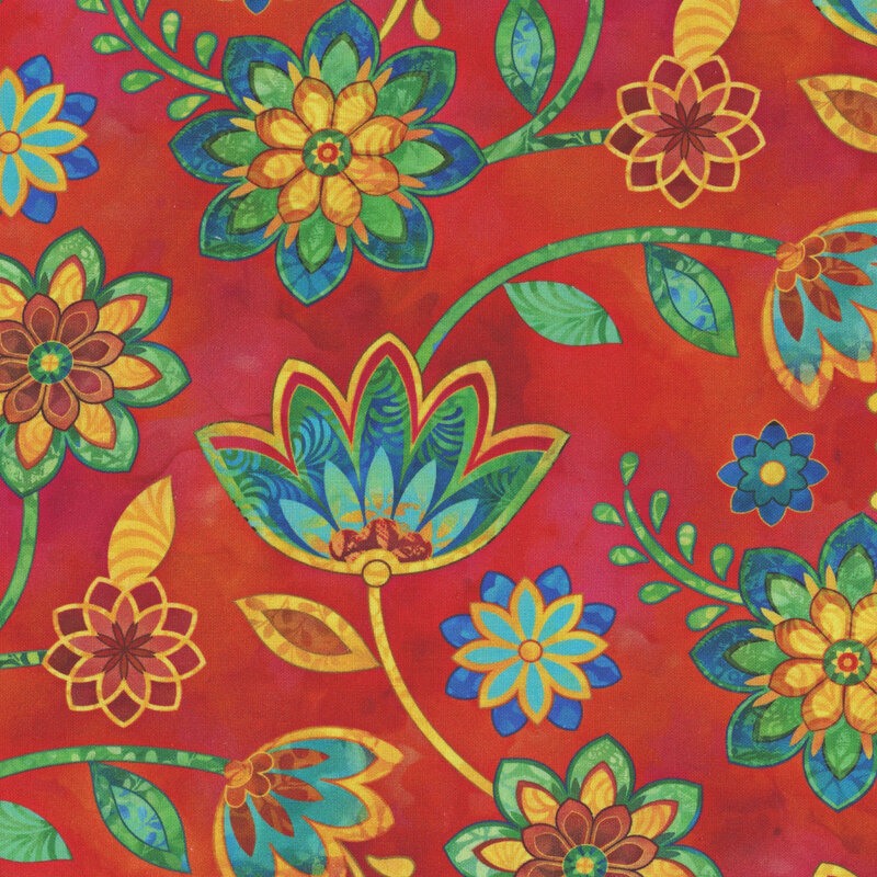 Red mottled fabric with large, colorful, bohemian style florals throughout.