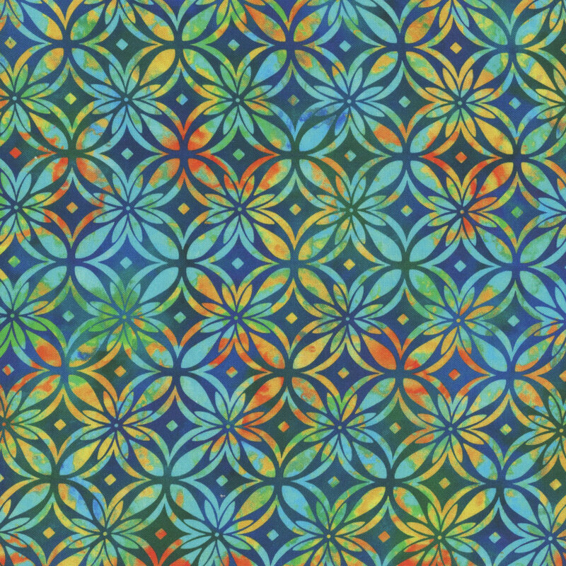 Blue mottled fabric with a repeated, geometric, colorful lattice design throughout.