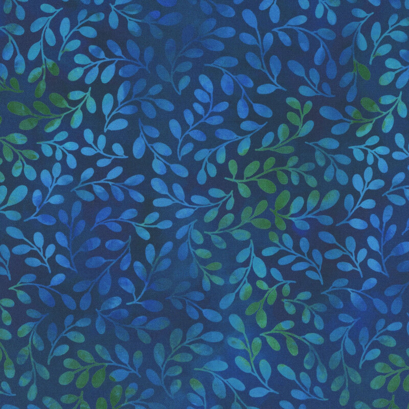 Blue mottled fabric with green and blue mottled sprigs throughout.