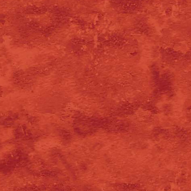 A mottled burnt orange fabric