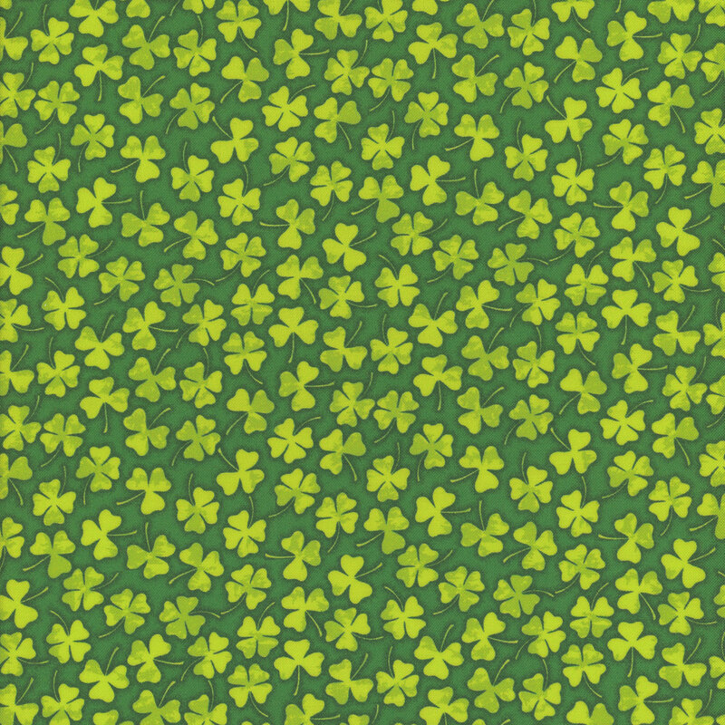 Dark green fabric packed with lime green shamrocks