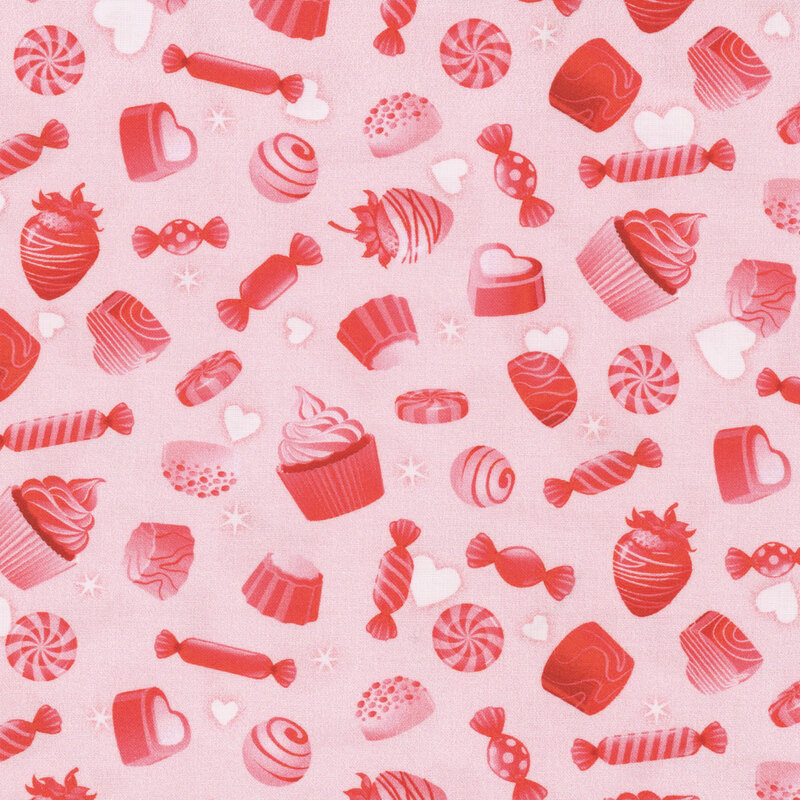 pink fabric with scattered strawberries, heart boxes, candy, and cupcakes