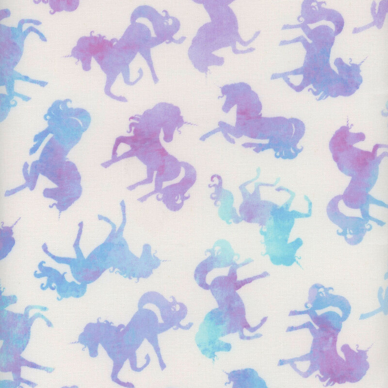 white fabric with scattered rainbow unicorns in different poses