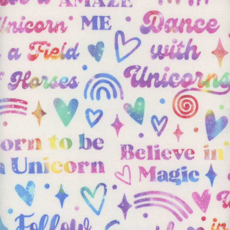 white fabric with multicolor unicorn- and- magic-themed phrases, hearts, sparkles, and rainbows