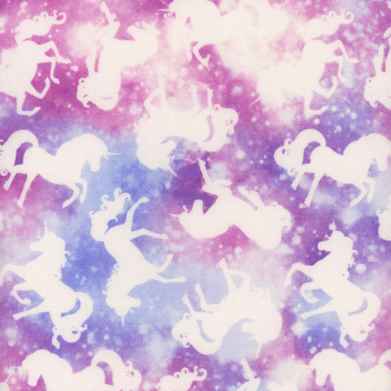 pastel rainbow galaxy fabric with scattered stars and sparkles with rotating solid white unicorns in different poses