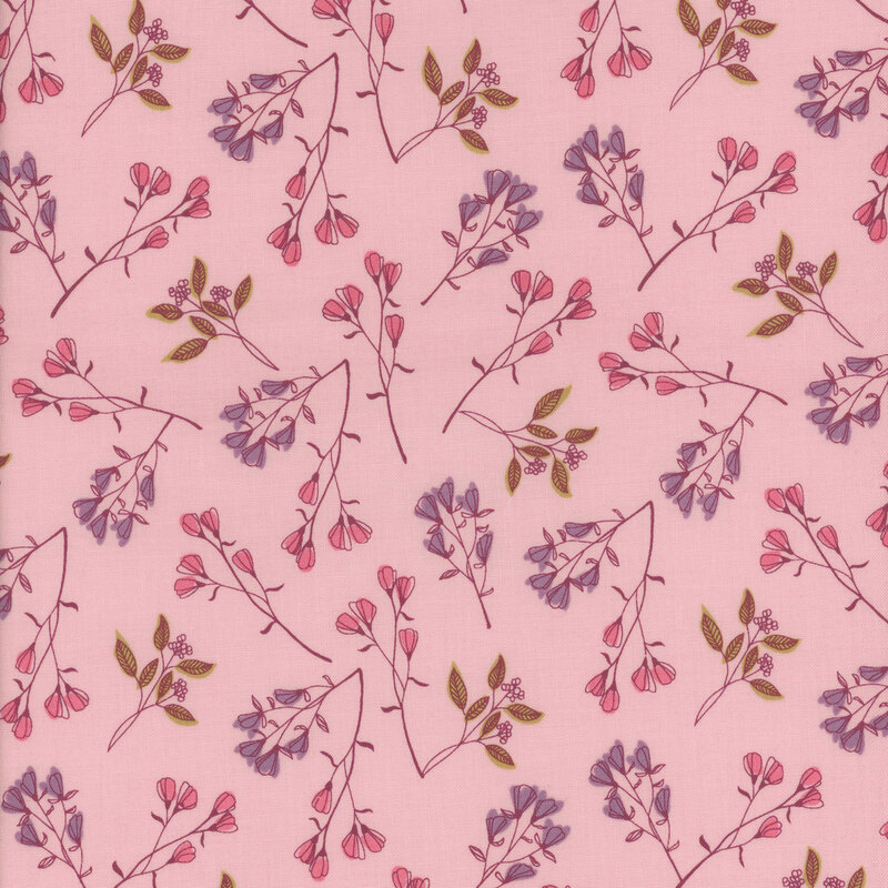 pink fabric with scattered sprigs of pink and purple flowers with thin stems and small leaves