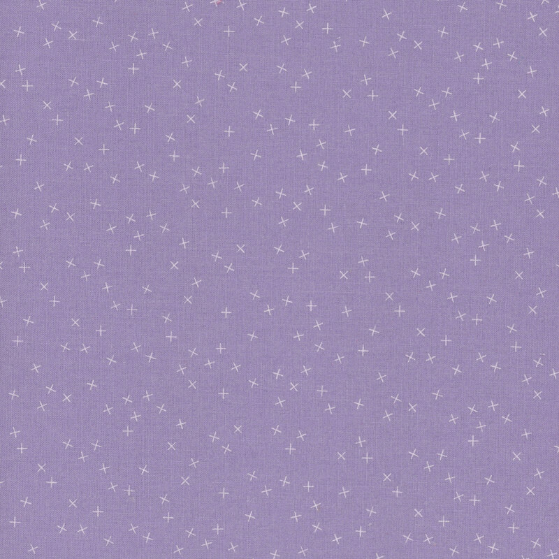 Pale purple fabric with small white X's scattered throughout