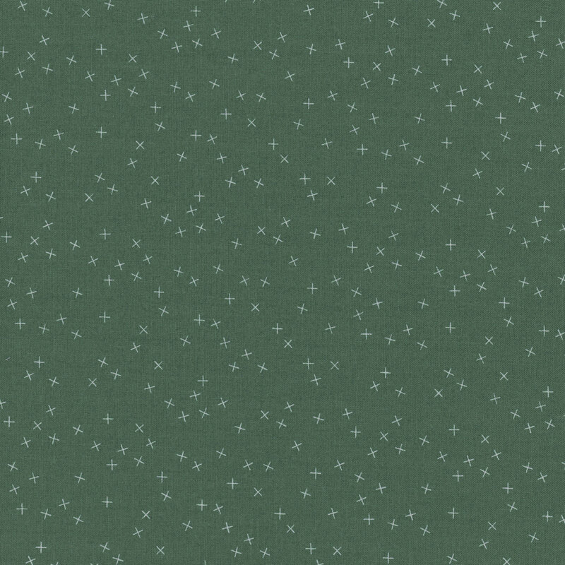 Emerald green fabric with small, tonal X's scattered throughout