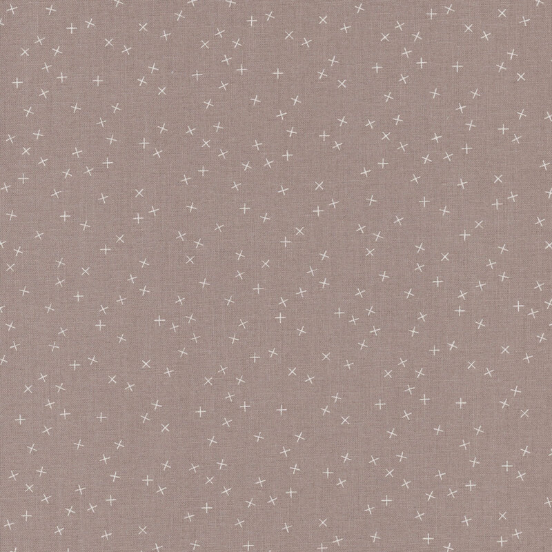 Gray fabric with small white X's scattered throughout