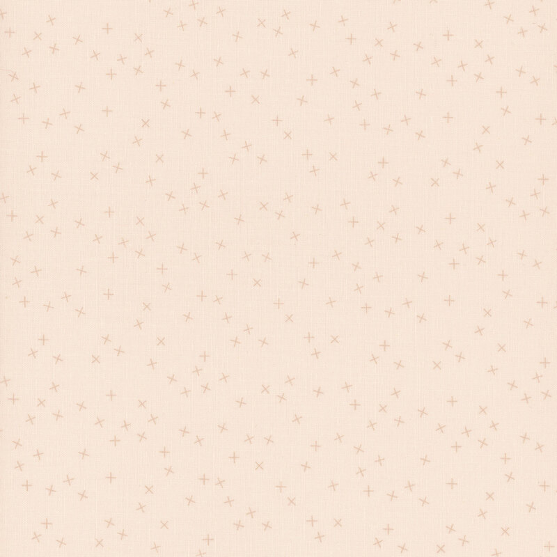 Light cream fabric with small gray X's scattered throughout