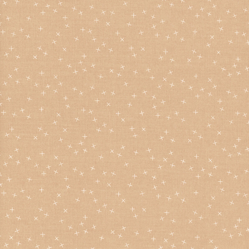 Tan fabric with small white X's scattered throughout