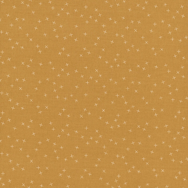 Golden fabric with small white X's scattered throughout