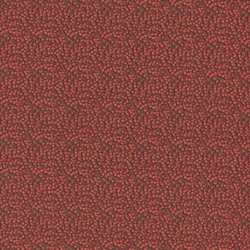 Tonal red fabric with tiny vines and red flower petals 