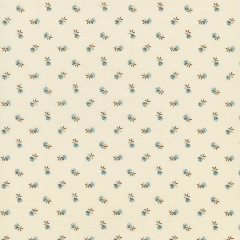 Cream colored fabric with a small, blue, ditsy floral pattern throughout