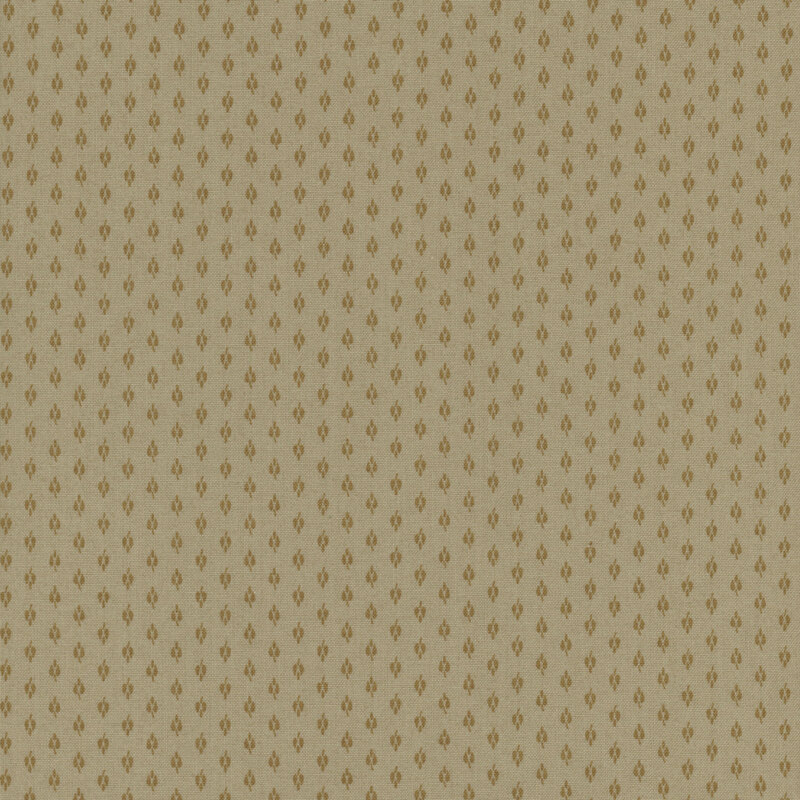 Tan fabric with small, brown repeating shapes throughout