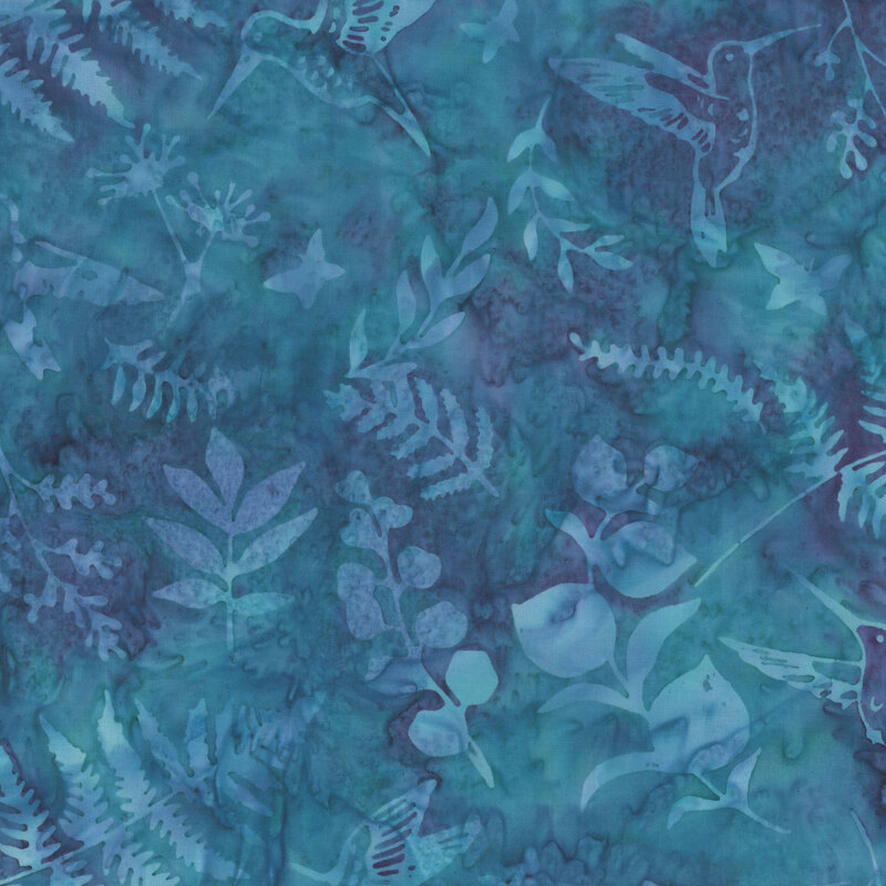 Dark aqua and purple mottled batik fabric with tonal sprawling leaves and hummingbirds.