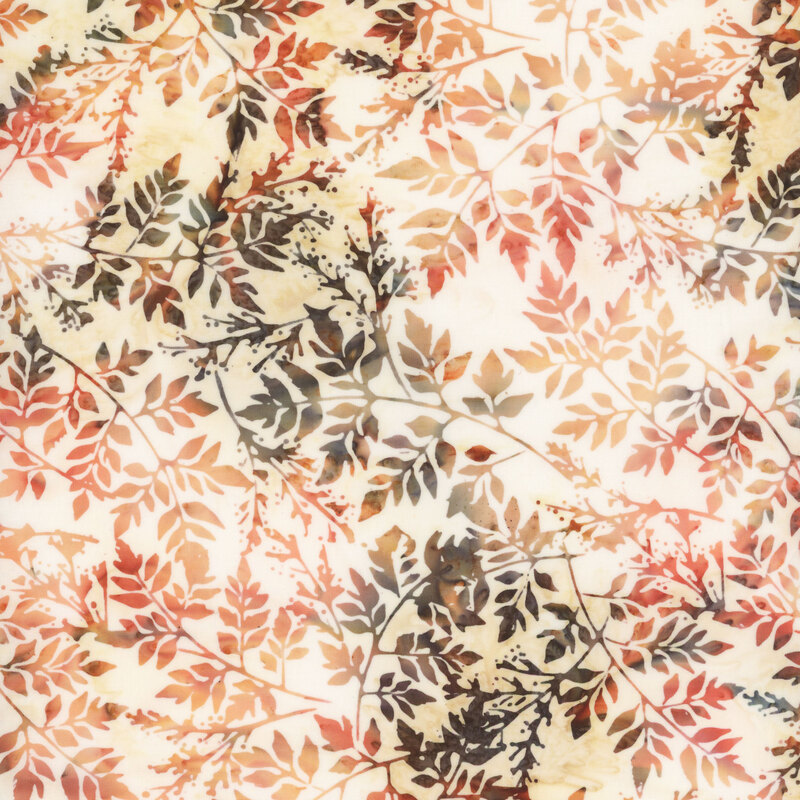 Cream batik with a burnt orange leaf pattern.