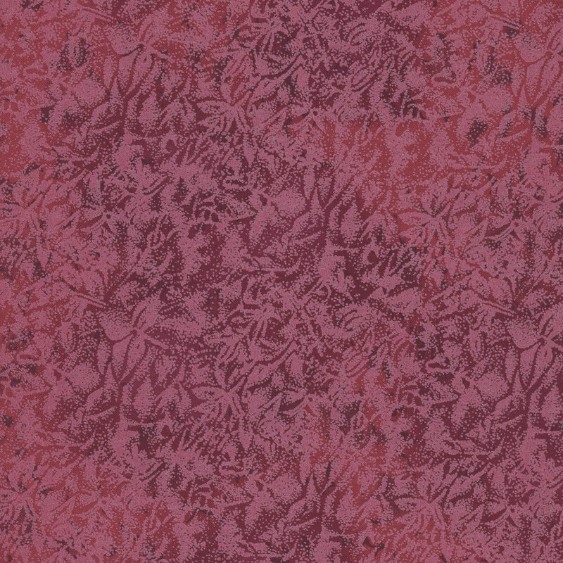 Wine red fabric featuring a mottled design with metallic glitter accents