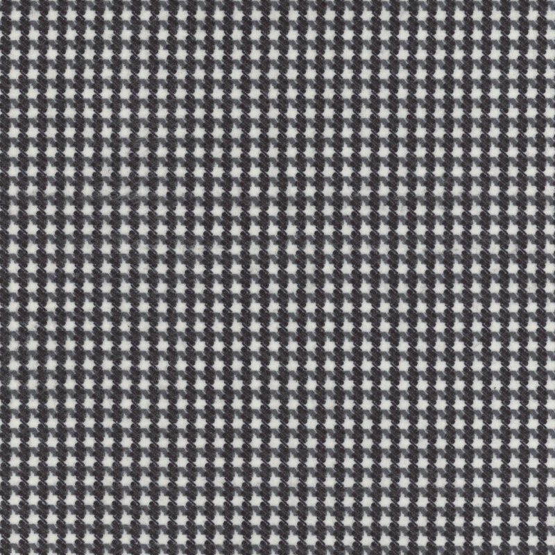 white flannel fabric with a black houndstooth pattern