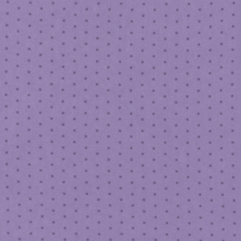 Purple flannel fabric with a tonal polkadot pattern