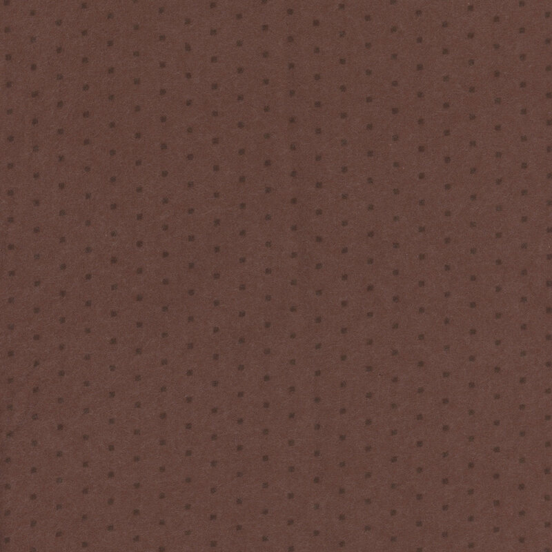 Brown flannel fabric with a tonal polka dot pattern 