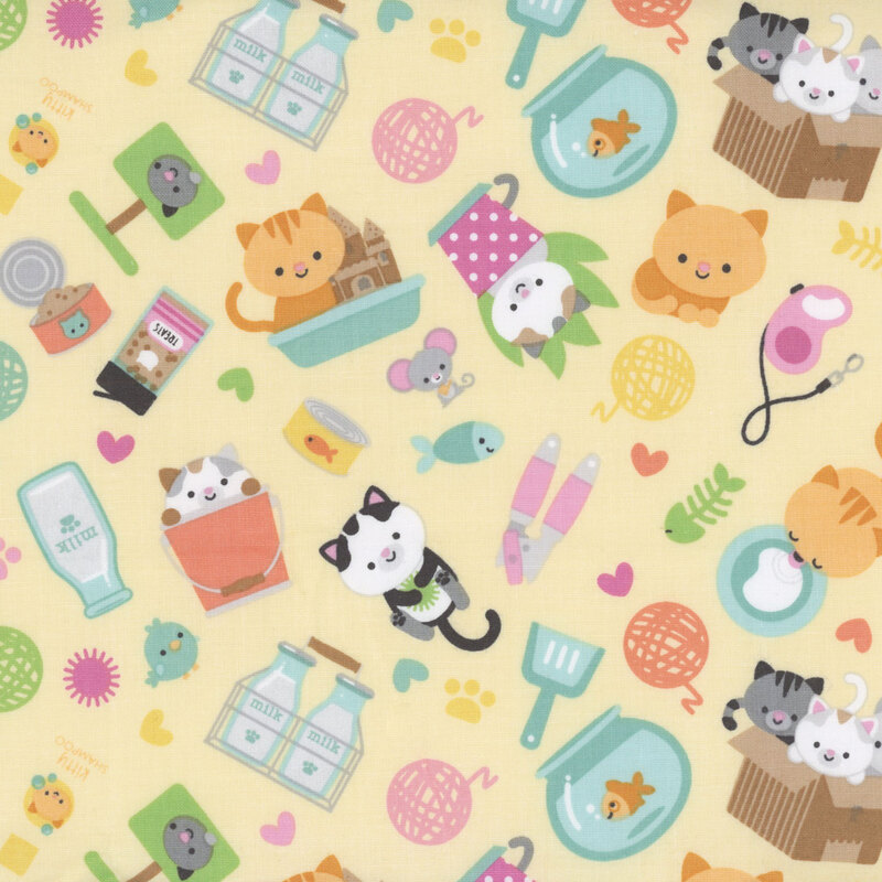 pastel yellow fabric with tossed cats, hearts, and other household items