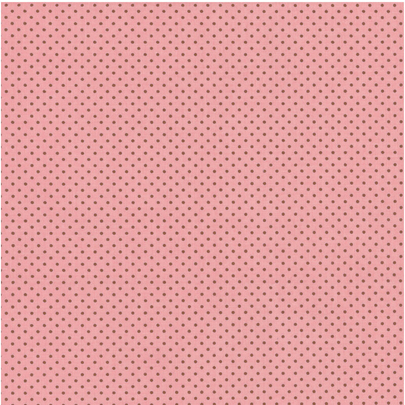 pastel pink fabric with small brown polka dots all over