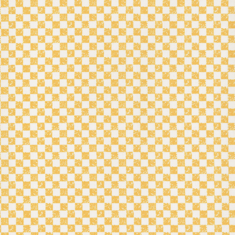 A mustard yellow and white checker print fabric