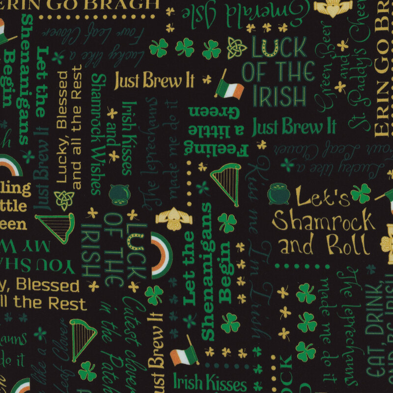 Black fabric with green and tan St. Paddy's Day phrases, flags, harps, and shamrocks