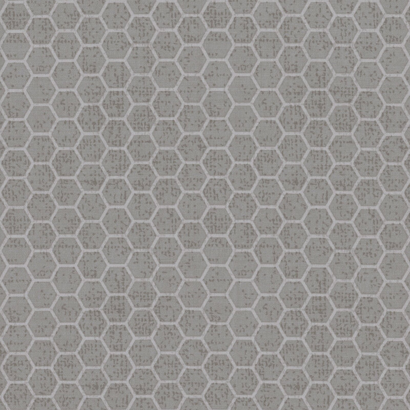 Grey fabric with a tonal geometric honeycomb pattern.