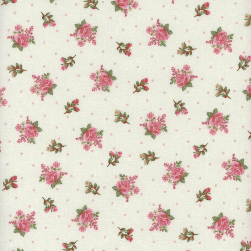 Cream fabric with pink polka dots and a ditzy rose pattern. 