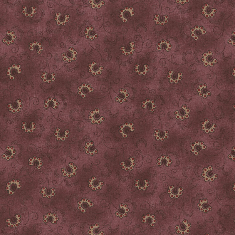 Mottled purple fabric with a swirling floral pattern 