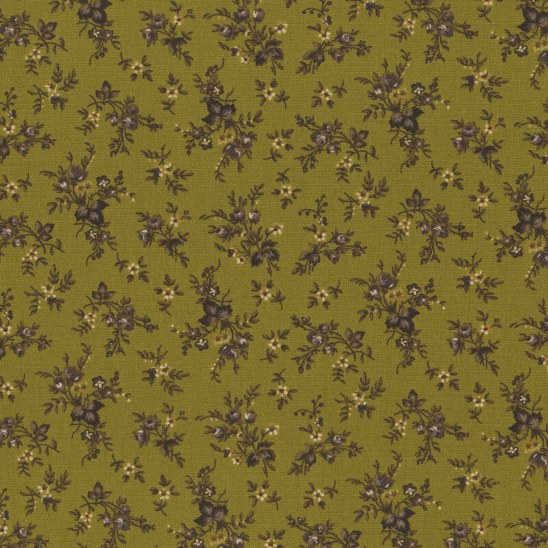 Green fabric with a tonal floral pattern