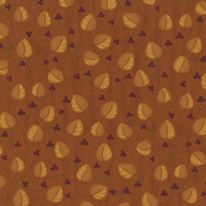 Orange fabric with a leaf and flower pattern 