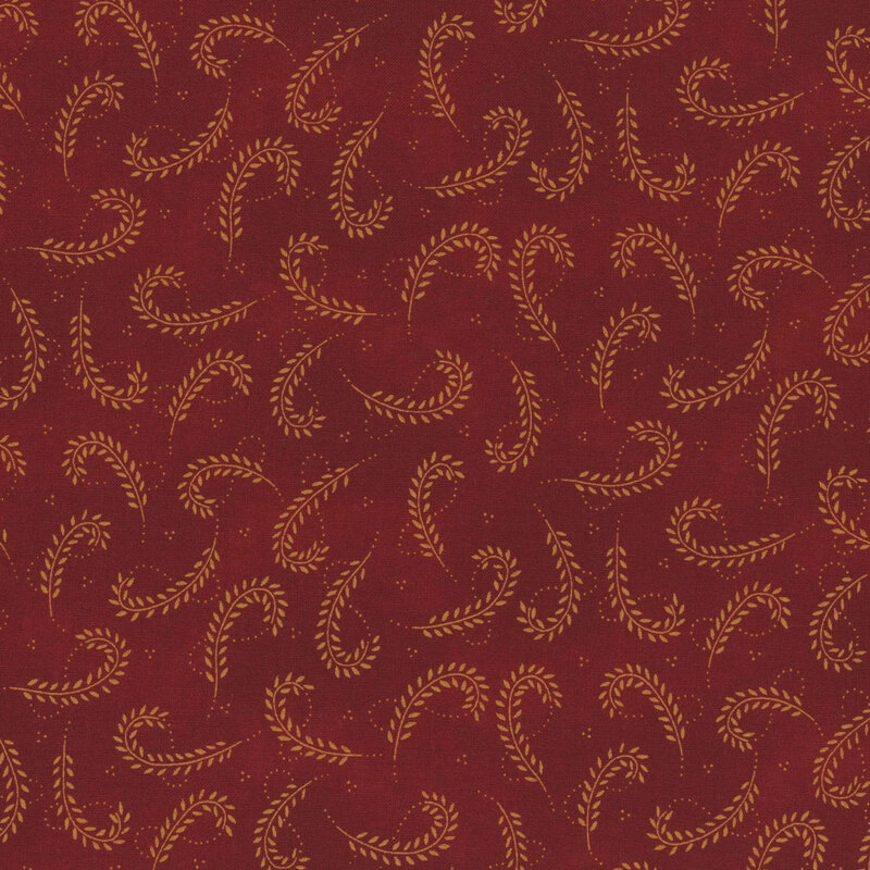 Mottled red fabric with a yellow wheat pattern 