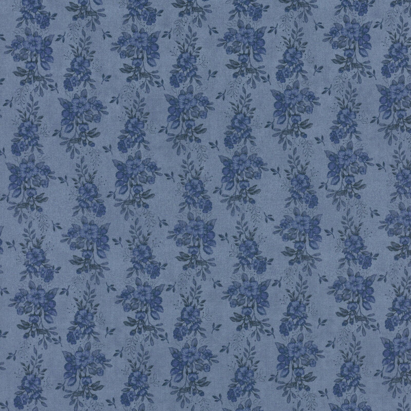 Blue fabric with a tonal floral stripe pattern 