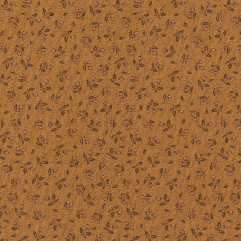 Orange fabric with a ditzy fruit pattern 