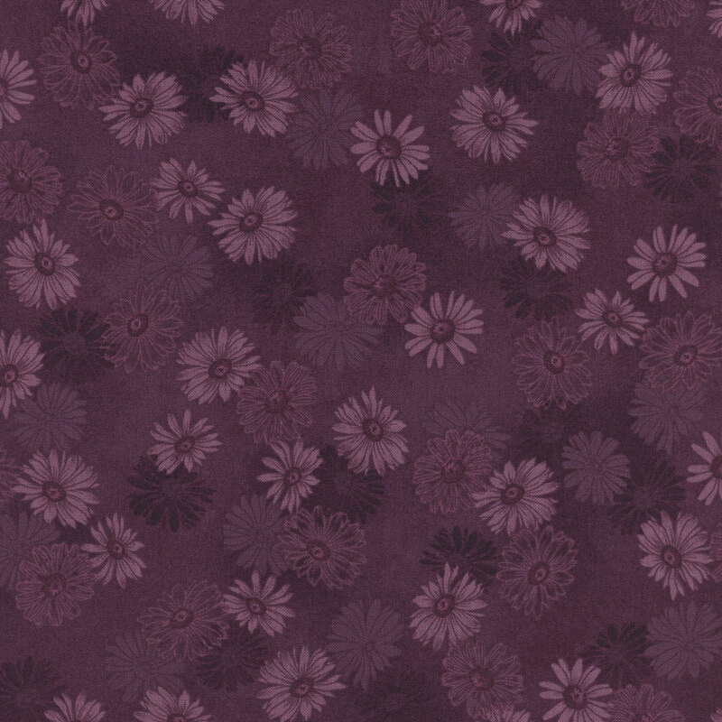 Mottled purple fabric with a tonal flower pattern 