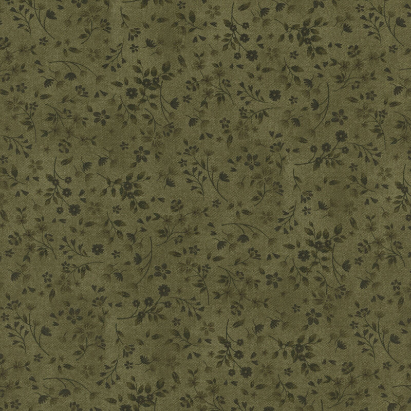 Mottled green fabric with a tonal leaf and flower pattern