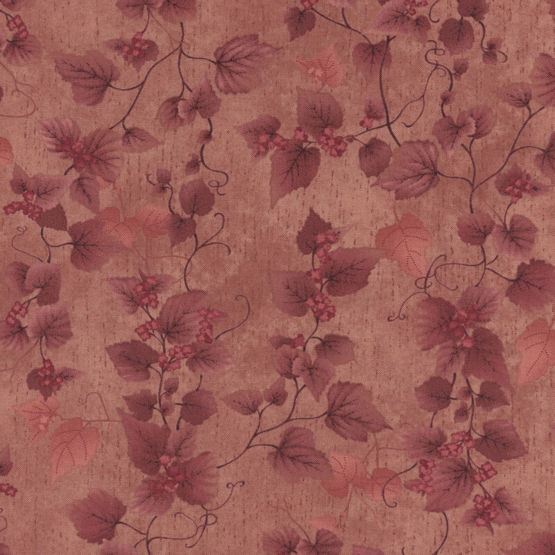 Mottled pink fabric with a tonal leaf pattern