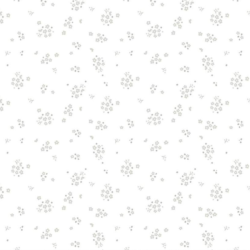 digital fabric with small gray floral clusters against a white background