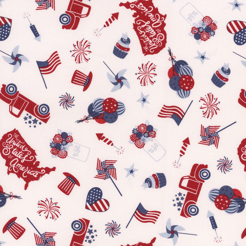 white fabric with tossed trucks, american flags, hearts with american flag designs, pinwheels, and other patriotic motifs