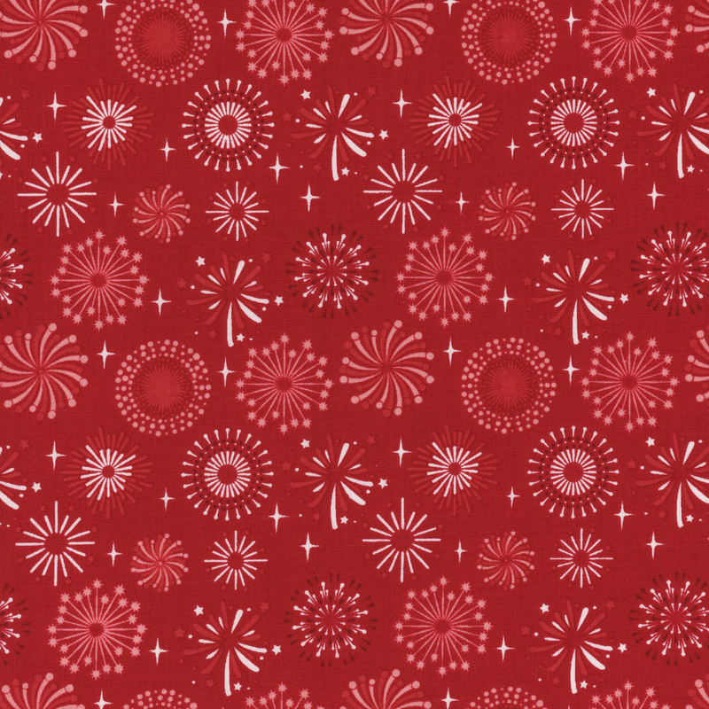 red fabric with red and white exploding fireworks