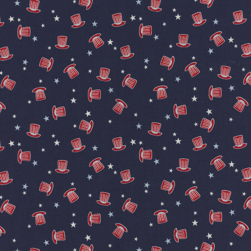 navy fabric with tossed patriotic hats with scattered white stars